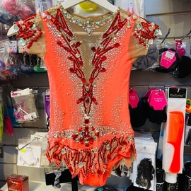 Peach pink leotard with crystals for rent